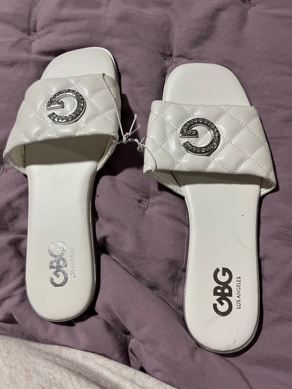 GBG Los Angeles White Quilted Slide Sandals with Silver Logo Accent
